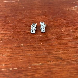 Cat stud earrings.
